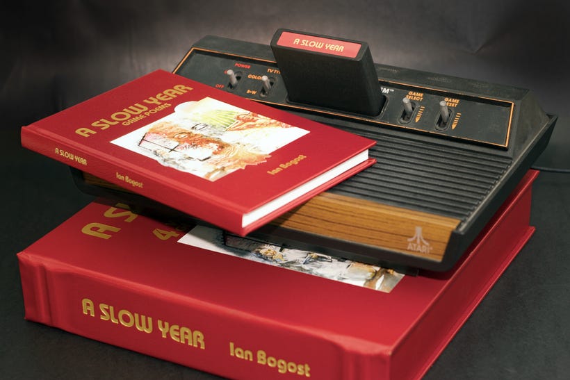 The limited edition of a Slow Year features a book and a classic Atari cart The limited edition of a Slow Year features a book and a classic Atari cart