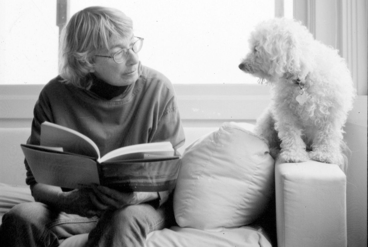 Image of Mary Oliver with her dog.