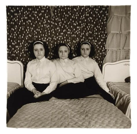 Black and white photographs of people including Susan Sontag and Norman Mailer