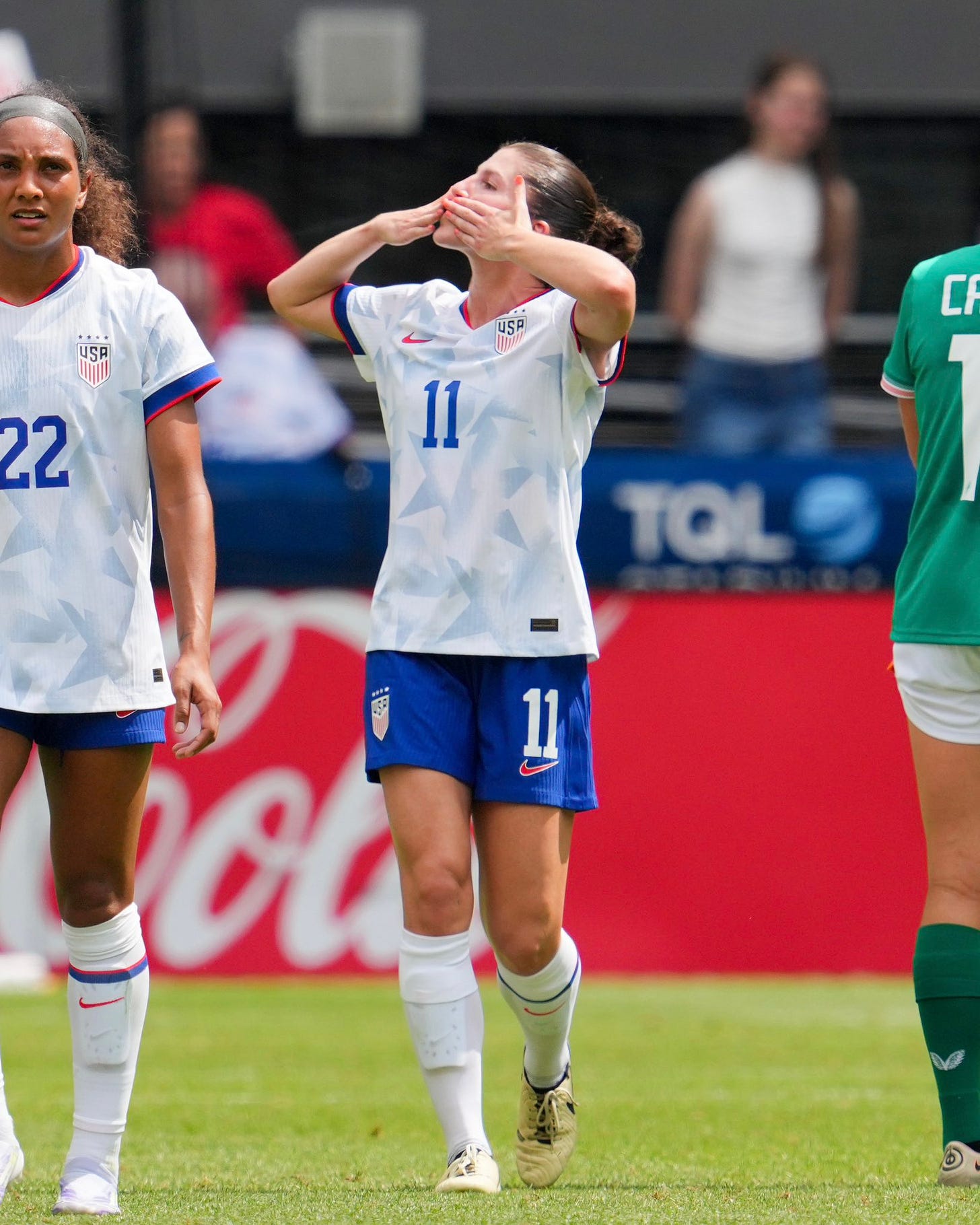 Rodriguez blowing a kiss to her family in the stands after scoring her first USWNT goal