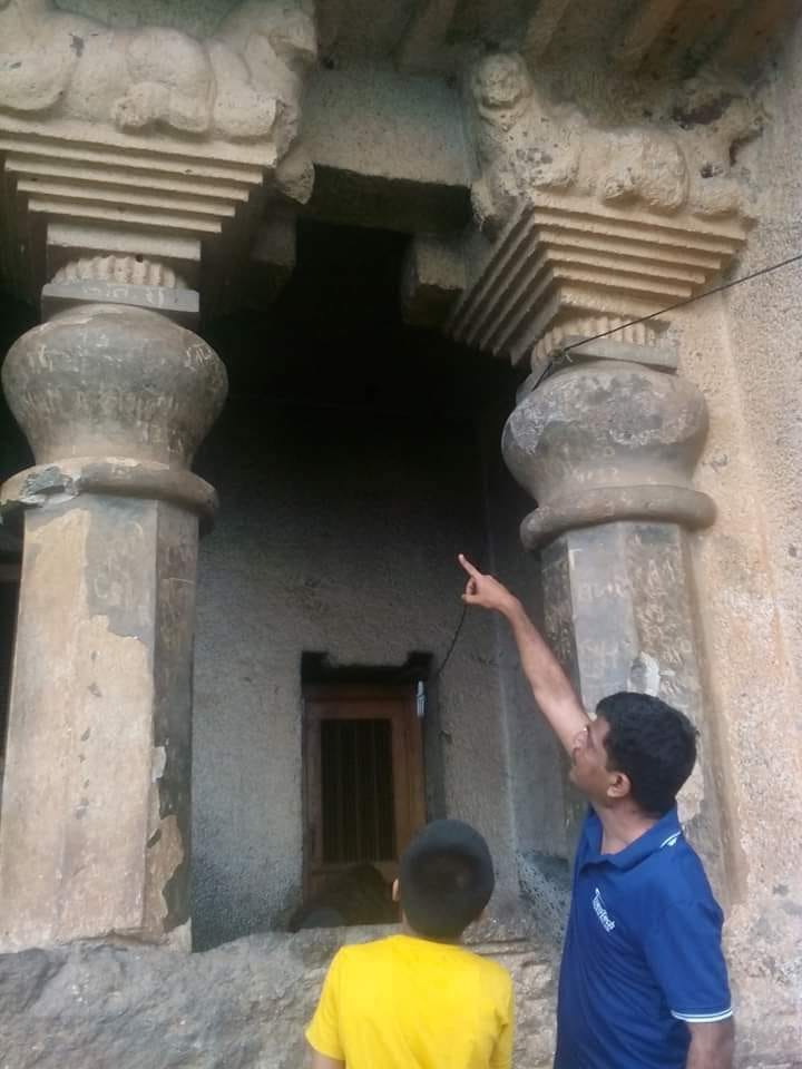 Photo of author with his dad who's pointing up at some columns on an ancient building Photo of author with his dad who's pointing up at some columns on an ancient building