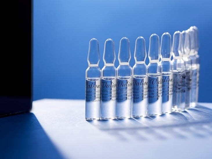 a row of test tubes sitting on top of a table