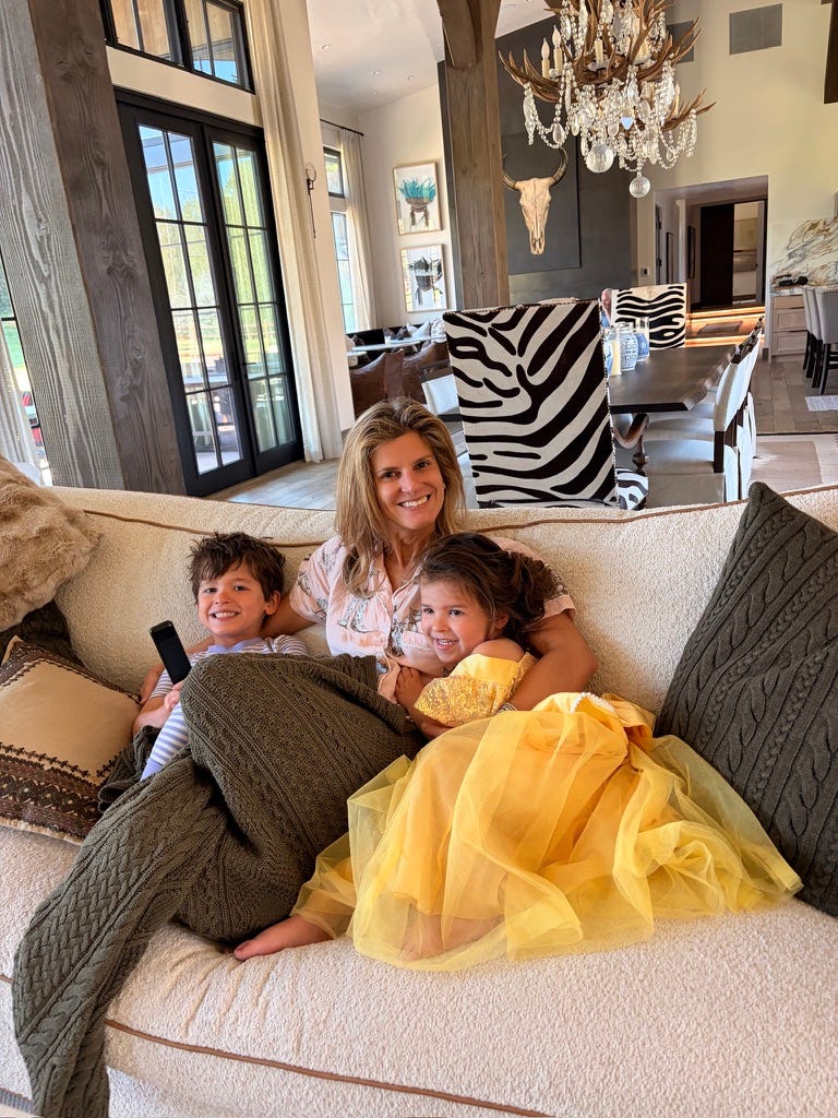 brighton butler with kids on couch in aspen