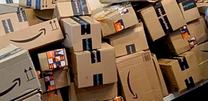 Photo of a pile of undelivered Amazon parcels.