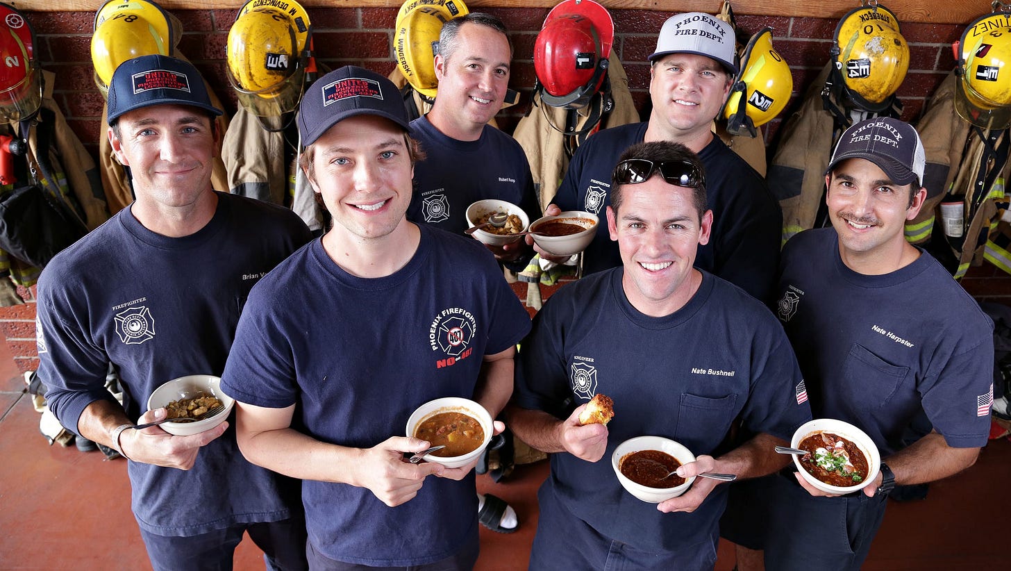Firefighters gather at Station 1 in downtown phoenix and show off their chili they created for us. They are L-R, Brian Vayda, Paul Elledge, Robert Kemp, Matt Huizenga (back in hat) Nate Bushnell, and Nate Harpster as seen in Phoenix on Oct. 15, 2014.