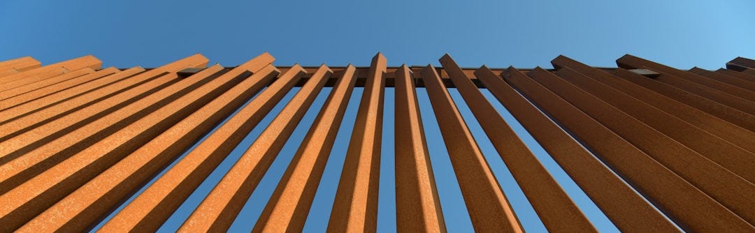 A very tall building with a sky in the background