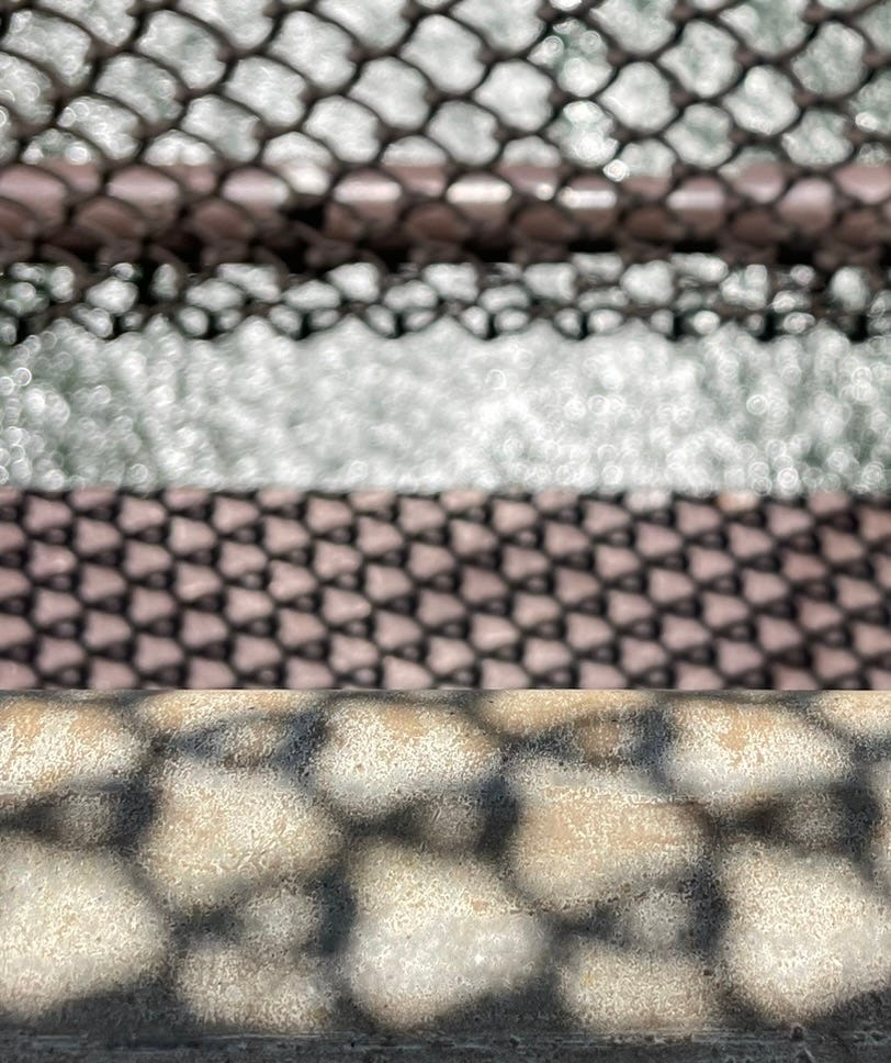 Fence shadows on the 59th street bridge