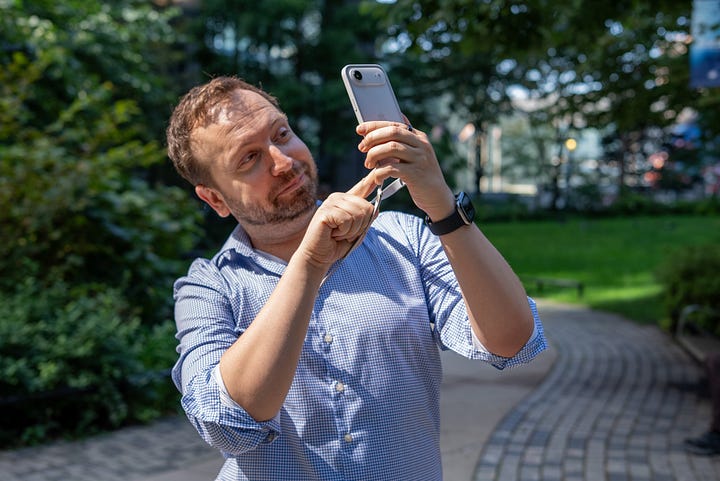 iPhone crossbody strap on tech reviewer Matt Swider