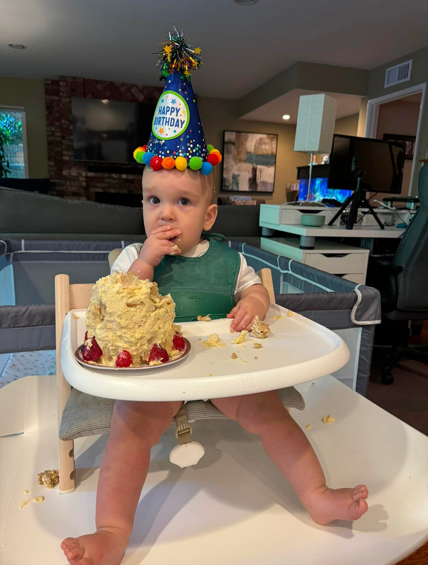 May be an image of 1 person, baby and food