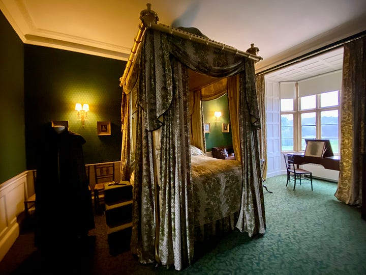 Images from top to bottom, left to right: Byron's four poster bed draped in pale green and topped with gold coronets; A display about his fame featuring a portrait of Byron, a miniature book of his poetry, and an impression of his seal in red wax; His study with dark red wood walls, a blue and yellow carpet with celandine-like flowers, a round table in the centre; ‘Edward III Room’, so named because the king visited Newstead Priory twice, with more dark red wood and hangings – this last was the bedroom of Byron the poet’s predecessor, the 5th Lord Byron, known as the ‘Wicked Lord’.