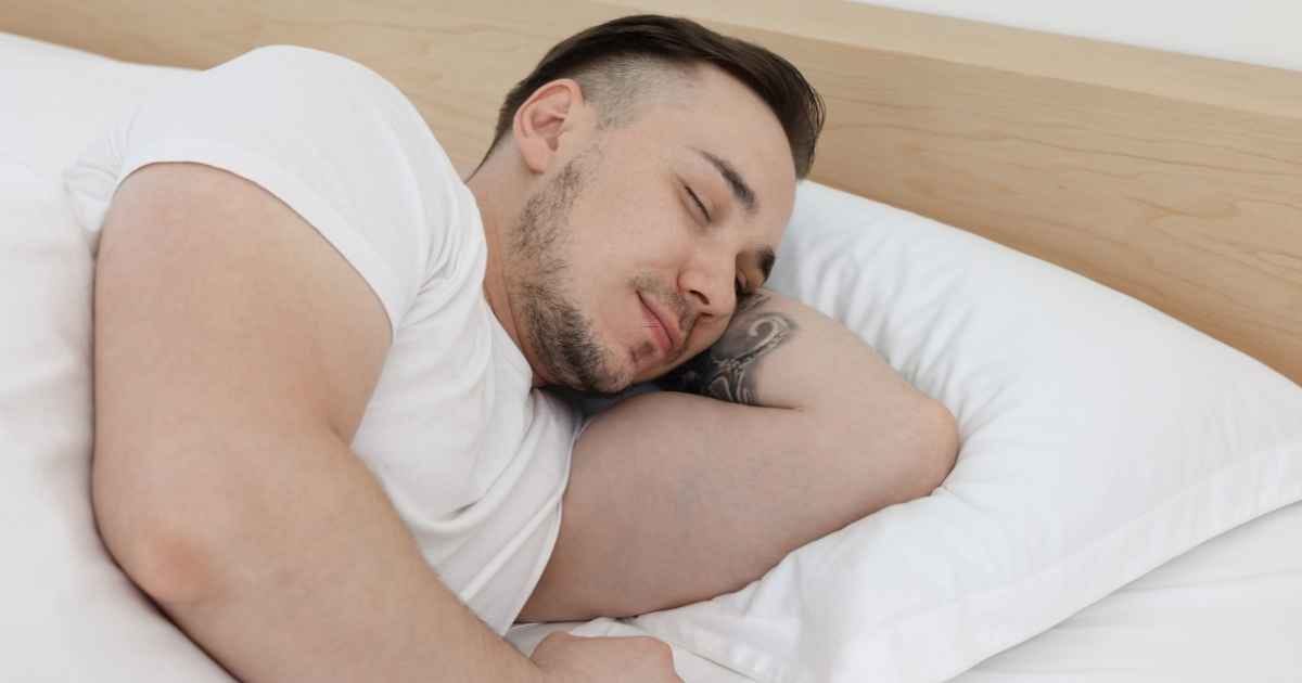 Man sleeping in bed 