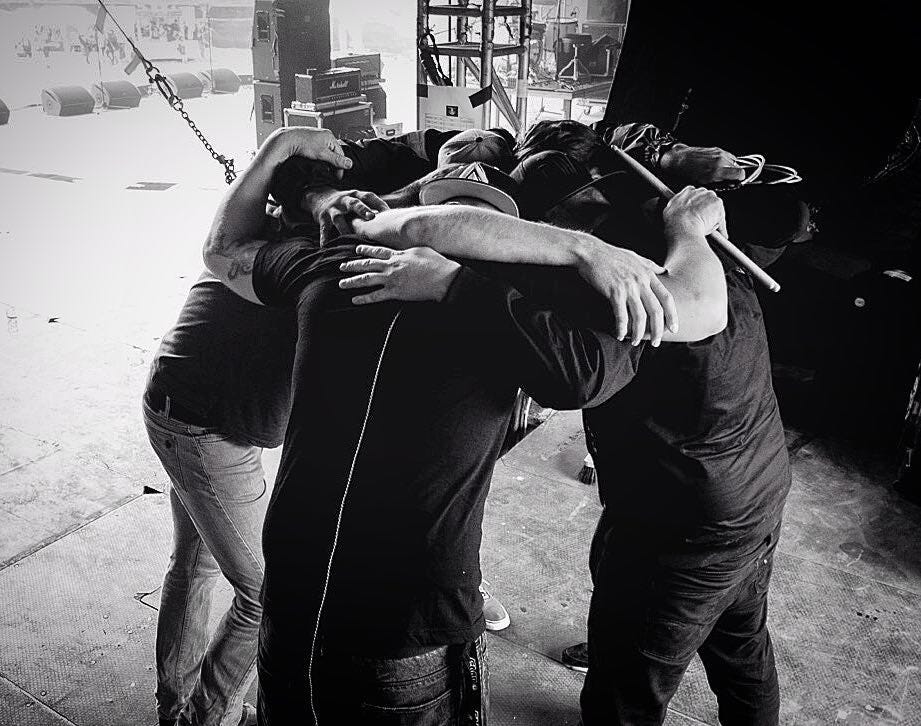 Bandphoto of the band GWLT on stage at a festival