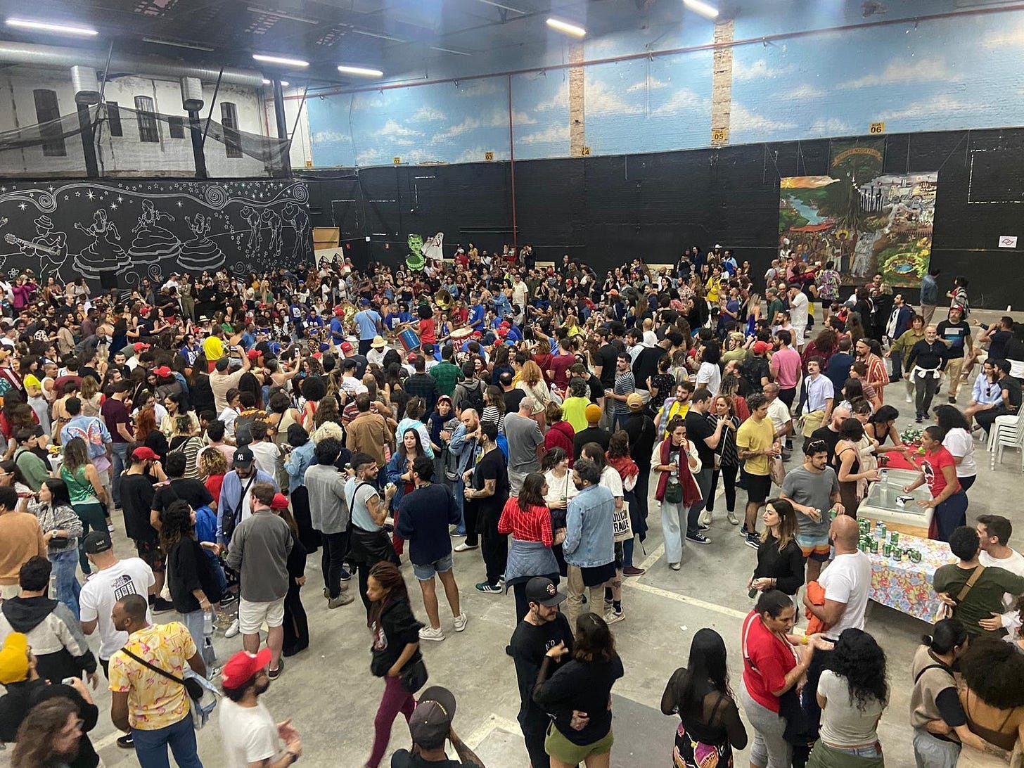 A large group of people in a room
Description automatically generated A large group of people in a room
Description automatically generated