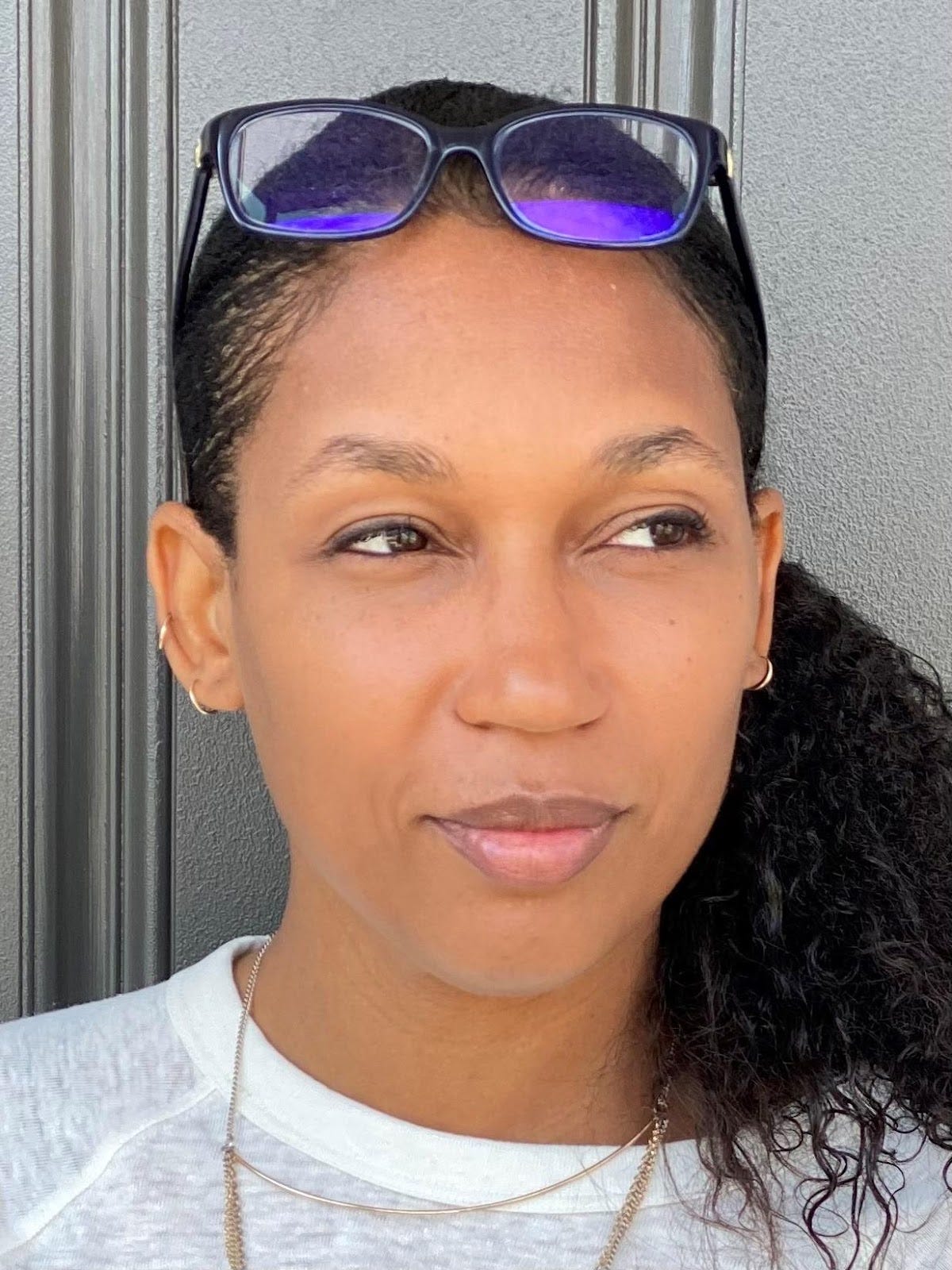 A person wearing sunglasses

Description automatically generated with low confidence