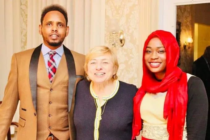 Maine Governor Janet T. Mills appears with Gateway Community Services CEO Abdullahi Ali and former Gateway employee Ekhlas Ahmed. 