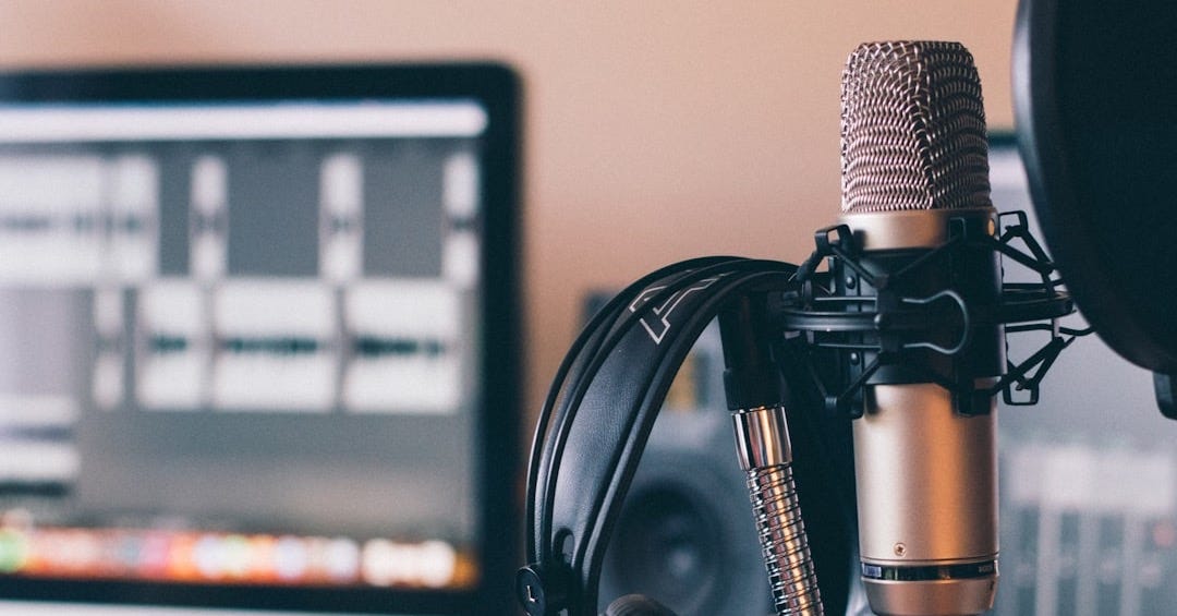 black and silver headphones on black and silver microphone black and silver headphones on black and silver microphone