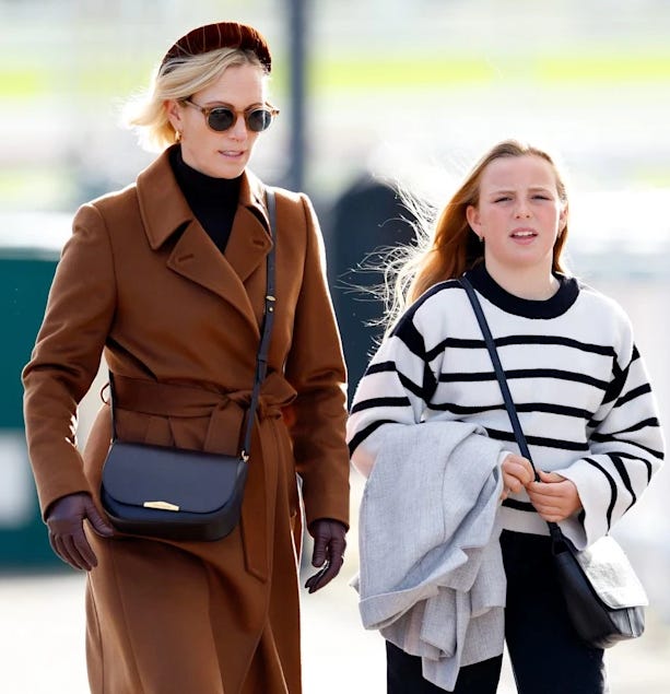 Zara Tindall and her daughter Mia walking together