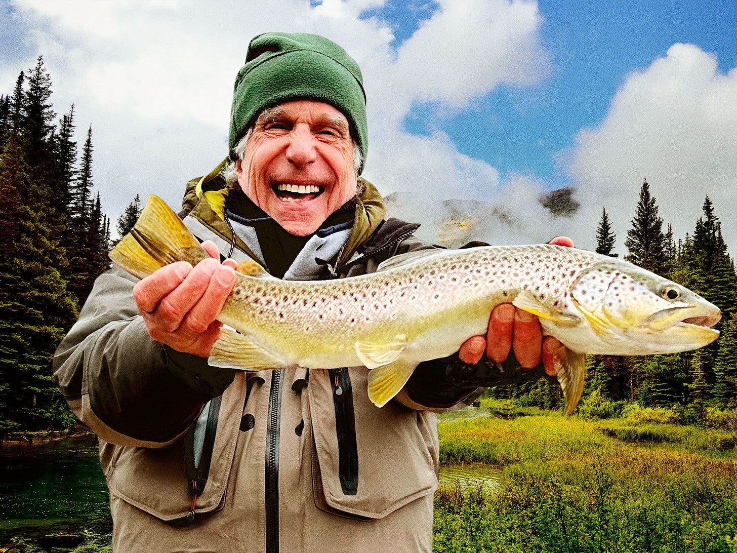 Image may contain Henry Winkler Face Head Person Photography Portrait Animal Fish Sea Life Trout Clothing and Hat