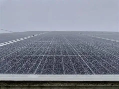 Frostcovered solar panel surface on a cloudy winter day | Premium Photo Frostcovered solar panel surface on a cloudy winter day | Premium Photo