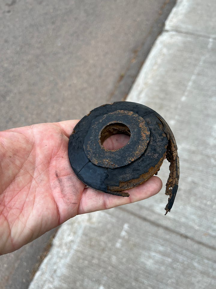 four images of things I've picked up off the ground in my walking. The first three are various screws and naisl. The last is an odd, heavy bit of round metal that appears to be a part from a car.