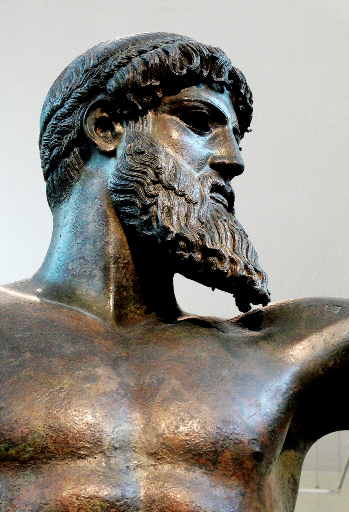 A statue of a person with a beard
AI-generated content may be incorrect.