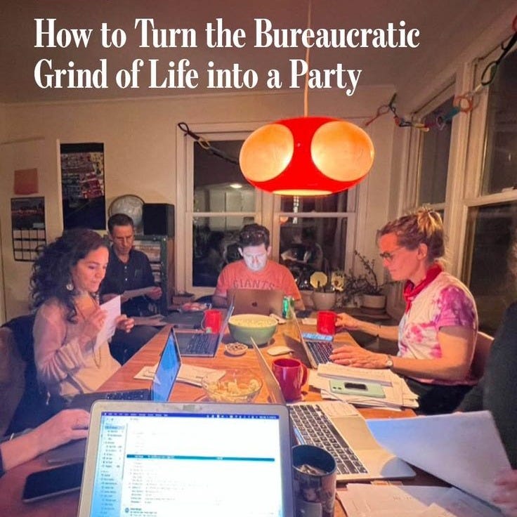 This may contain: a group of people sitting around a table with laptops