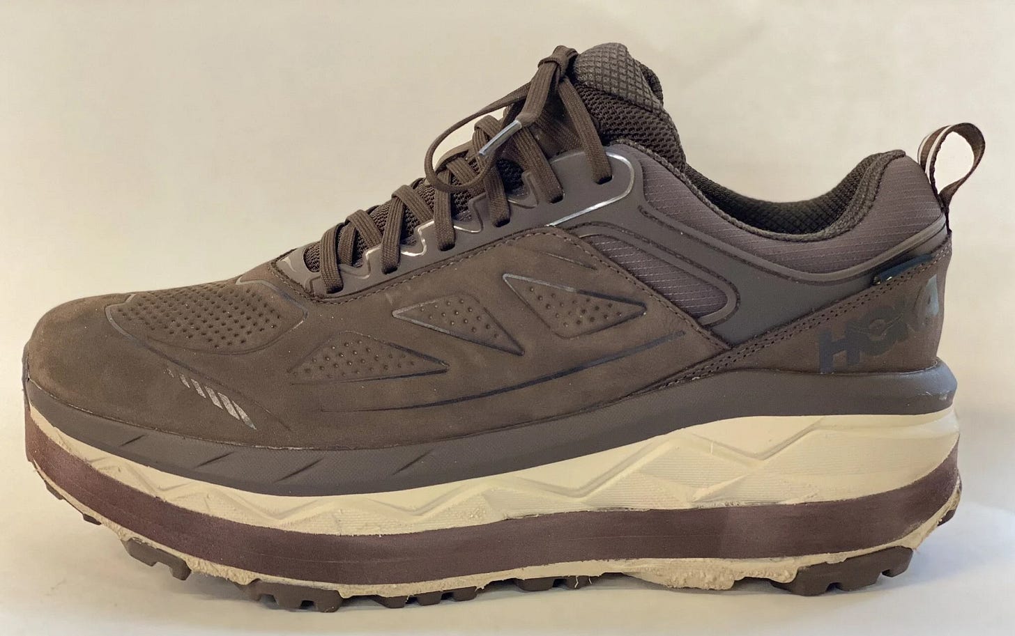 a side view of a show with additional lift added to the sole