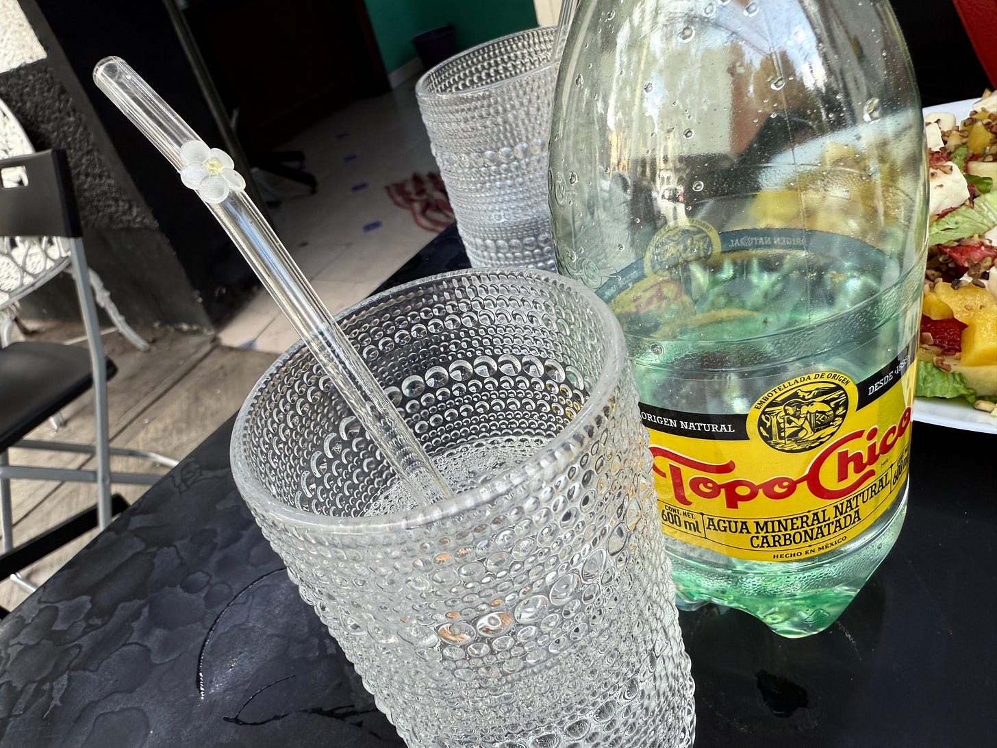 Topo Chico water bottle and glass Topo Chico water bottle and glass