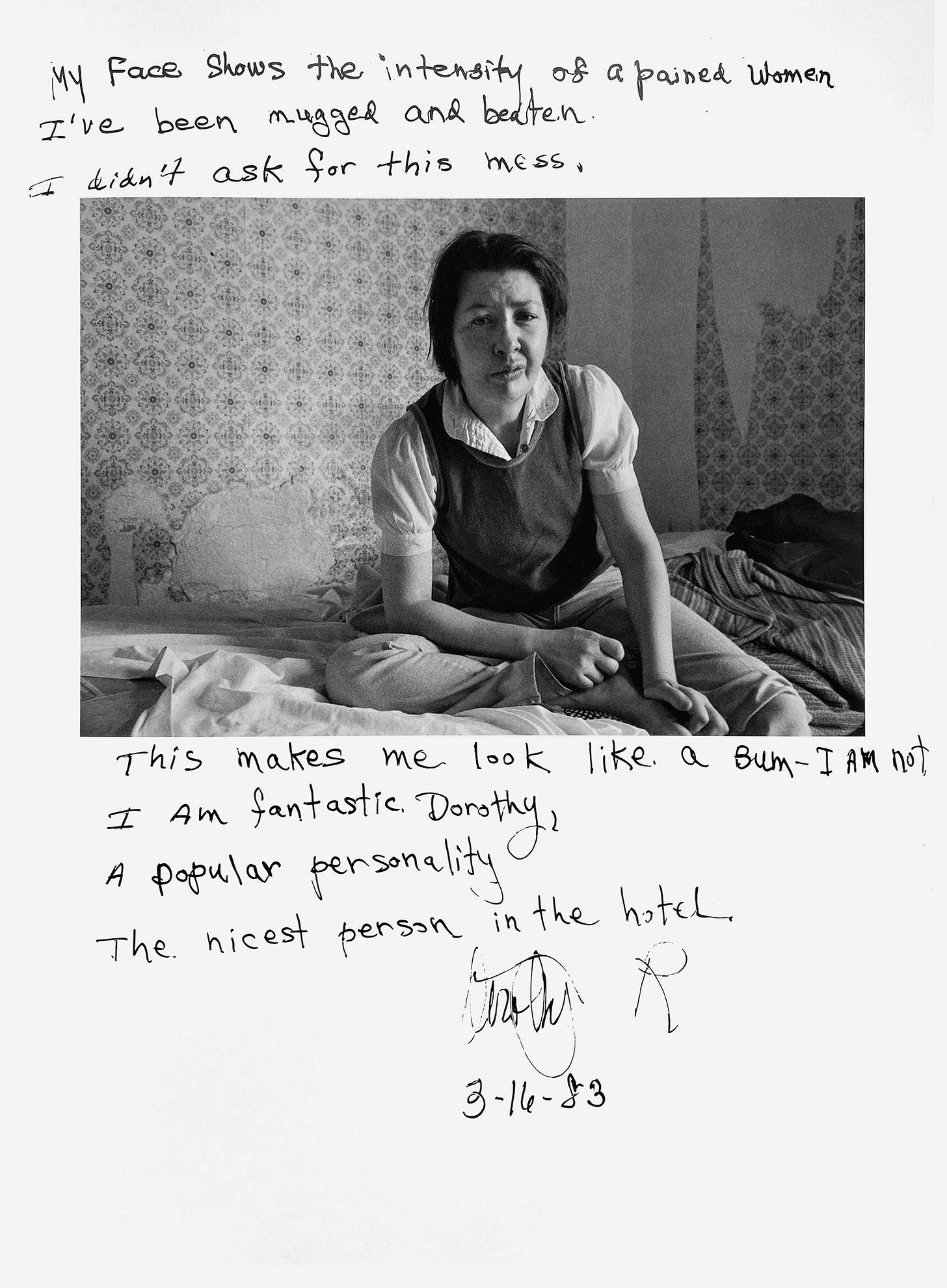 A woman sits on a bed with a pained expression on her face. A handrwitten captions says, "My face shows the intensity of a pained women. I’ve been mugged and beaten. I didn’t ask for this mess. This makes me look like a bum — I am not. I am fantastic Dorothy, a popular personality, the nicest person in the hotel. —Dorothy R, 3-16-83"