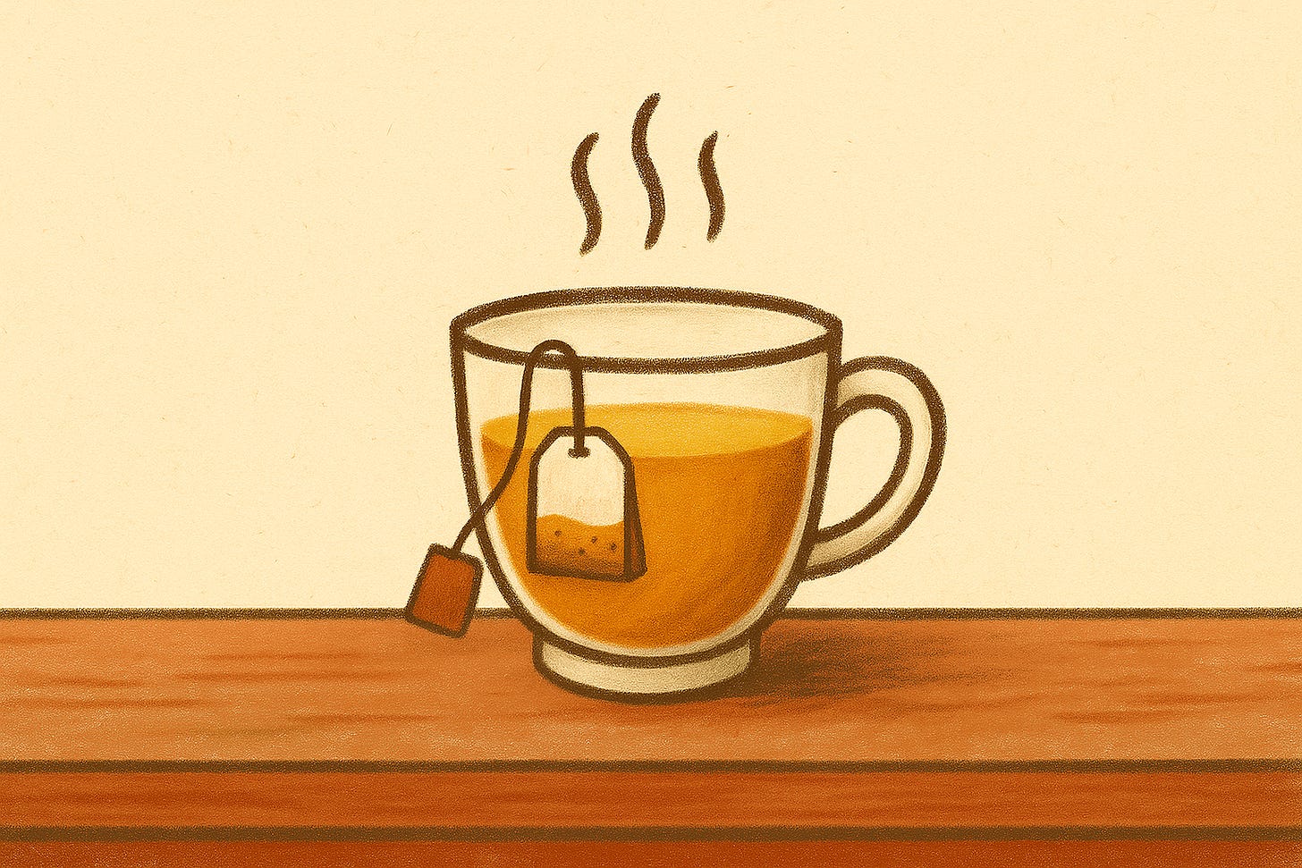 A steaming cup of tea with a tea bag resting on the table, indicating the brewing process.