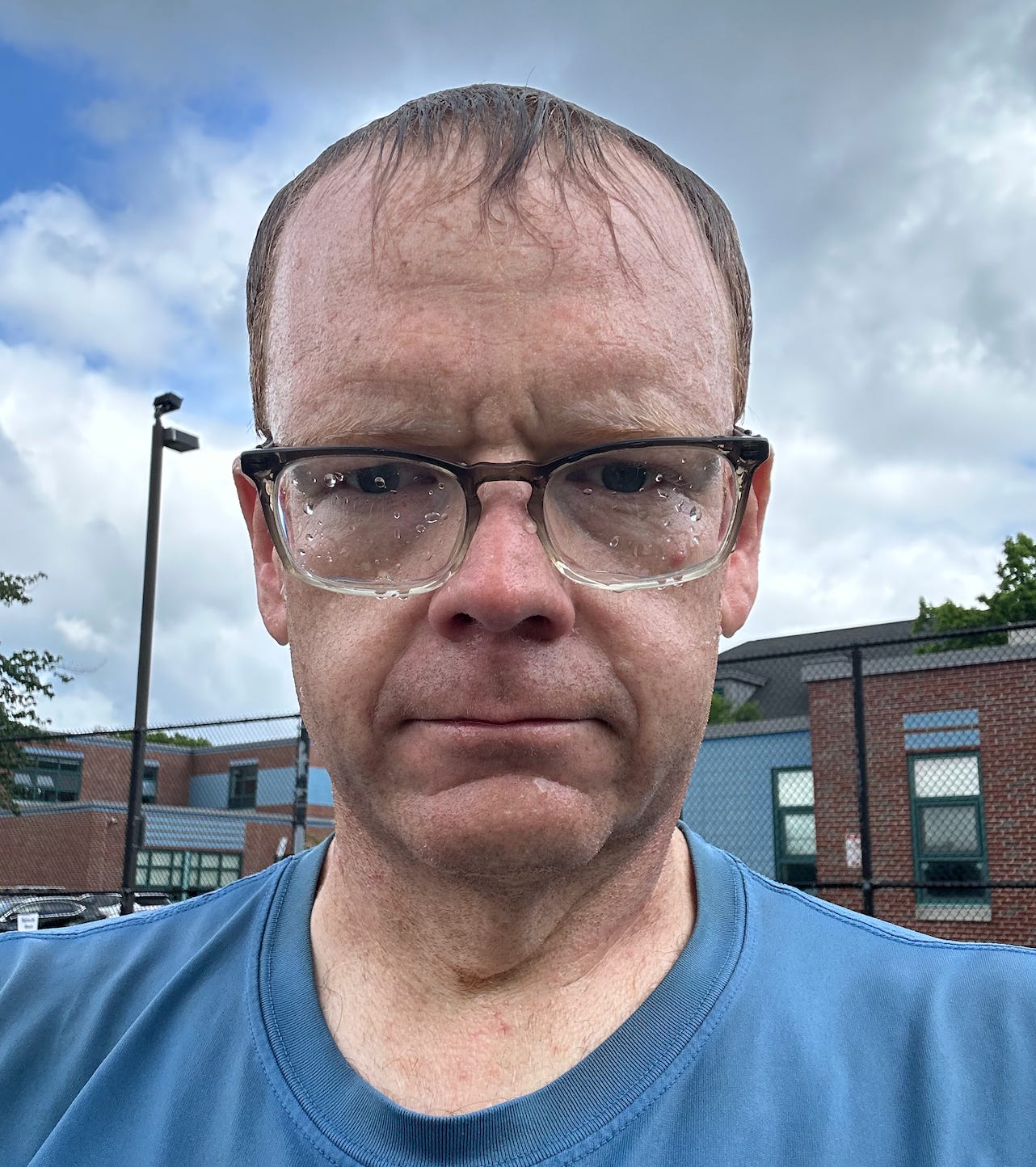 45-year-old  man lookin' like a wet dog.