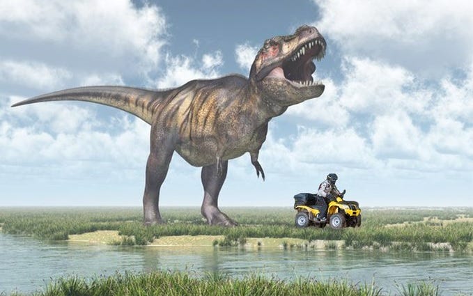 An old painting, possibly from an encyclopedia or children's book, of a T-Rex in a wetland, with a guy riding a yellow ATV photoshopped in. The original CPSC tweet's caption read 'Ted wasn't sure how he ended up in the Cretaceous Period, but he was sure glad he wore a helmet. Good job, Ted,' followed by the URL for the CPSC's ATV Safety site An old painting, possibly from an encyclopedia or children's book, of a T-Rex in a wetland, with a guy riding a yellow ATV photoshopped in. The original CPSC tweet's caption read 'Ted wasn't sure how he ended up in the Cretaceous Period, but he was sure glad he wore a helmet. Good job, Ted,' followed by the URL for the CPSC's ATV Safety site
