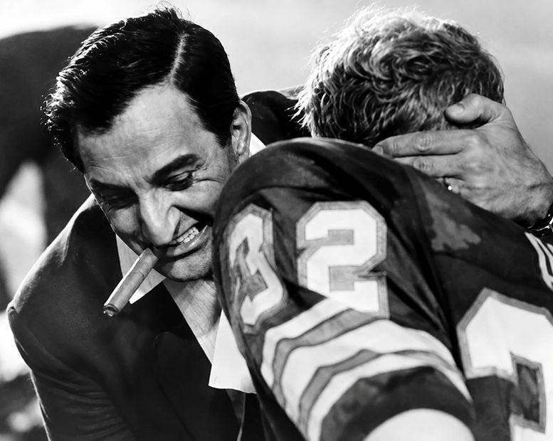 Owner Danny Thomas celebrates with Joe Auer who ran the opening kickoff for a touchdown in the Miami Dolphin’s first game as a franchise in 1966. Courtesy of the Miami Herald. Owner Danny Thomas celebrates with Joe Auer who ran the opening kickoff for a touchdown in the Miami Dolphin’s first game as a franchise in 1966. Courtesy of the Miami Herald.