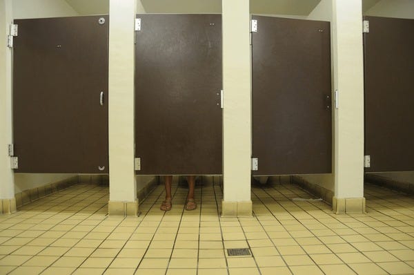 74 Bathroom Stall Feet Royalty-Free Images, Stock Photos & Pictures |  Shutterstock