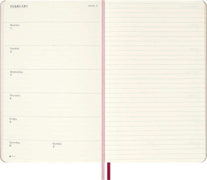 A Moleskine paper planner showing a clean weekly layout.