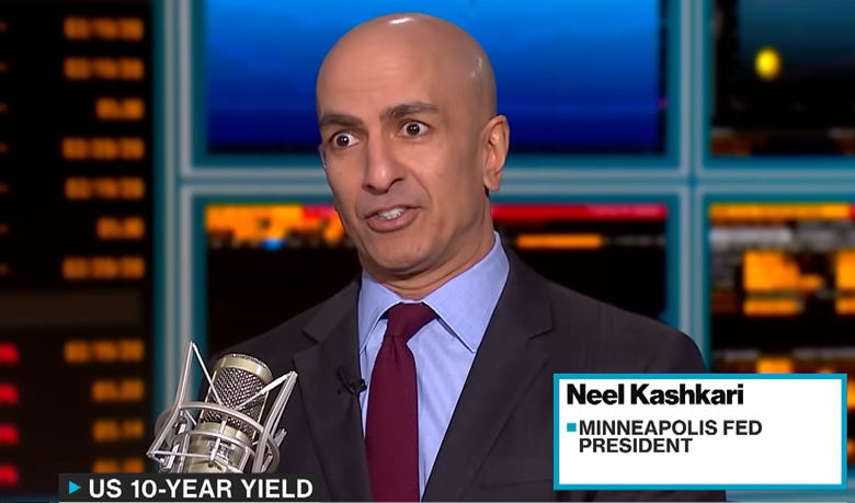 A person in a suit and tie

Description automatically generated