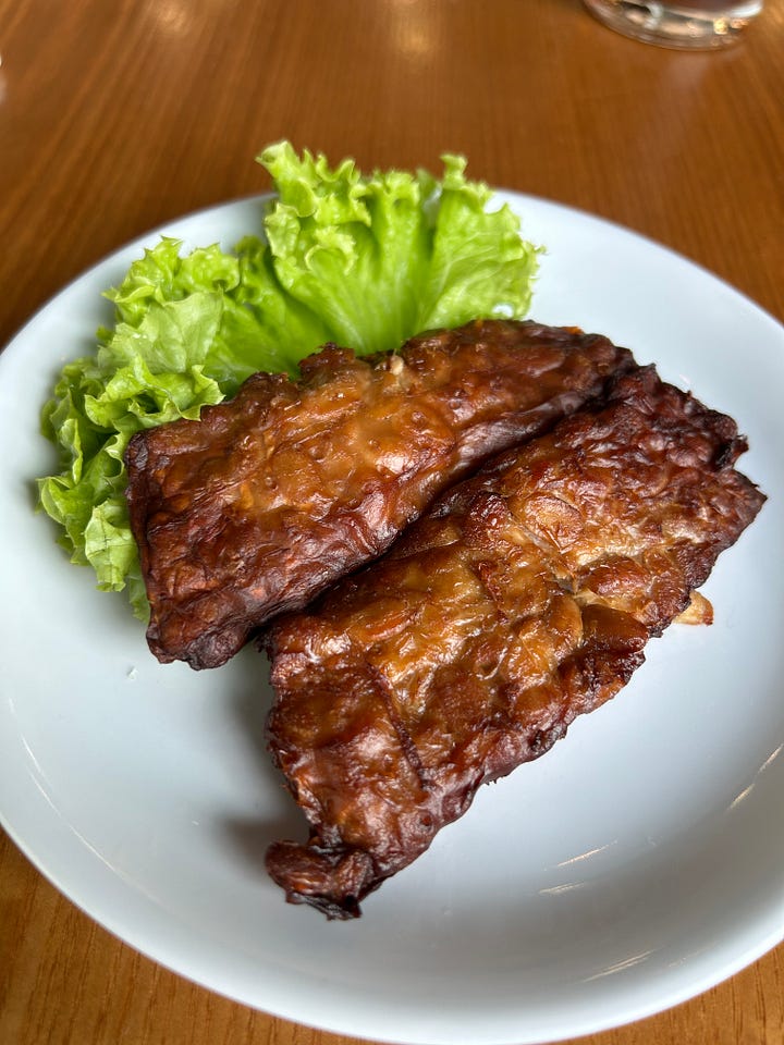A picture of tempeh bacon and a photo of barbecued shiitake mushrooms on skewers