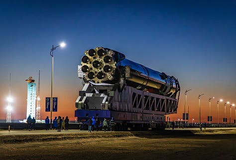 LandSpace's Zhuque-3 Y1 vehicle heading to the launch pad and recieving its payload fairing.