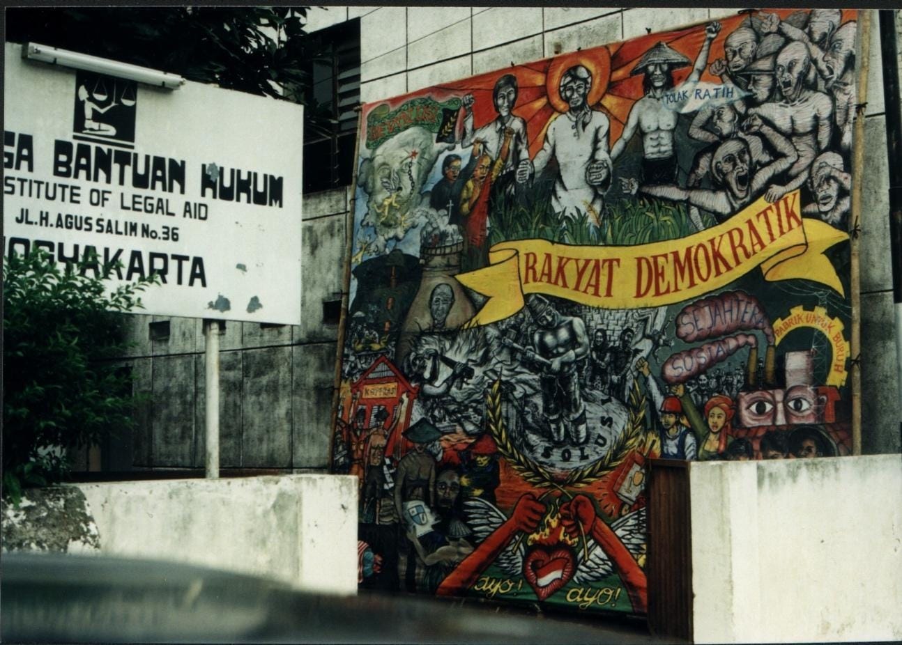 A large mural on a wall
Description automatically generated A large mural on a wall
Description automatically generated