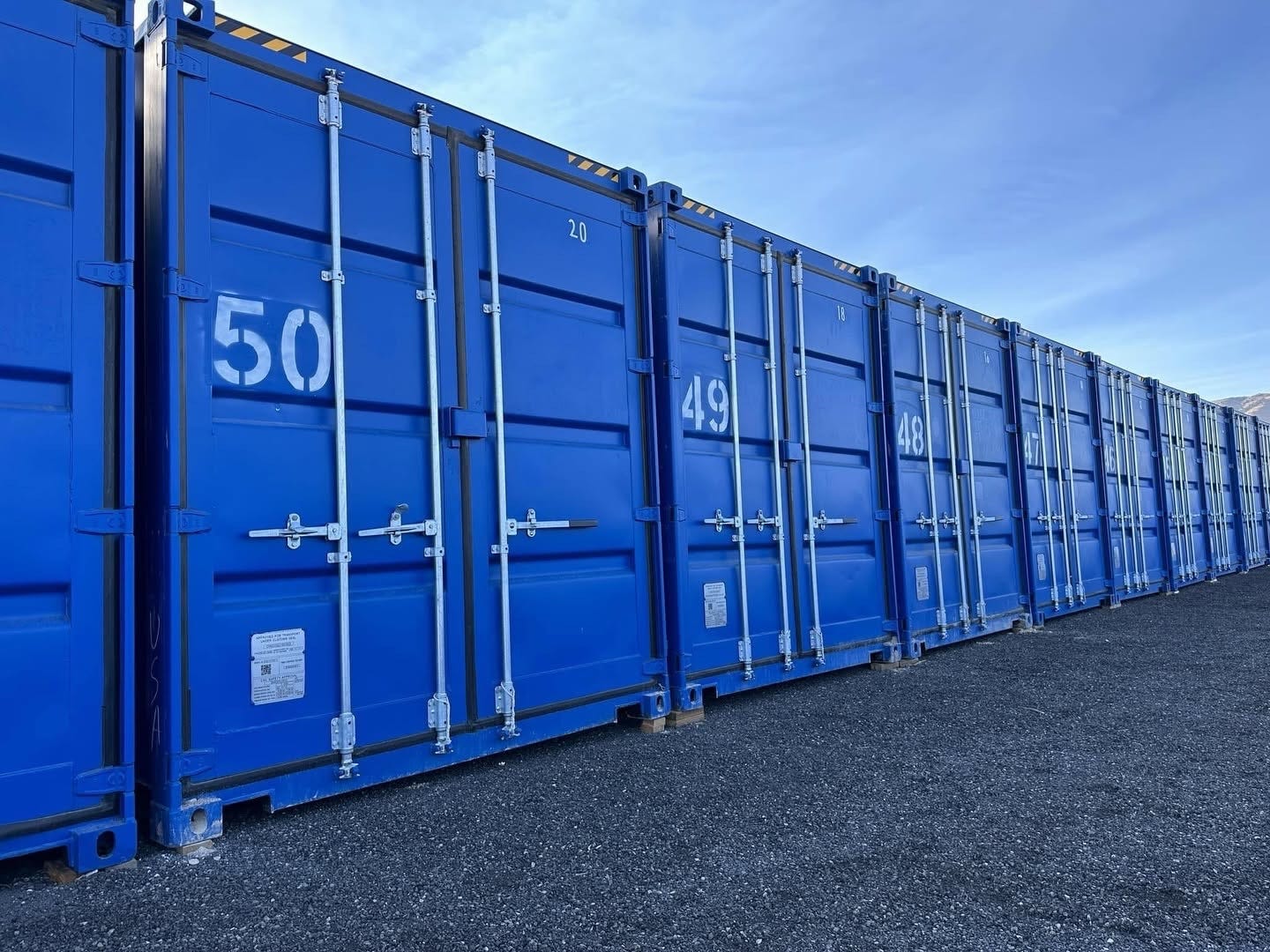 blue shipping containers at the USA RV & Storage facility blue shipping containers at the USA RV & Storage facility