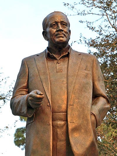 A bronze statue of John D. MacArthur A bronze statue of John D. MacArthur