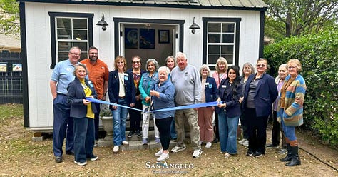Pictures of a shed in the backyard, a ribbon cutting event. 