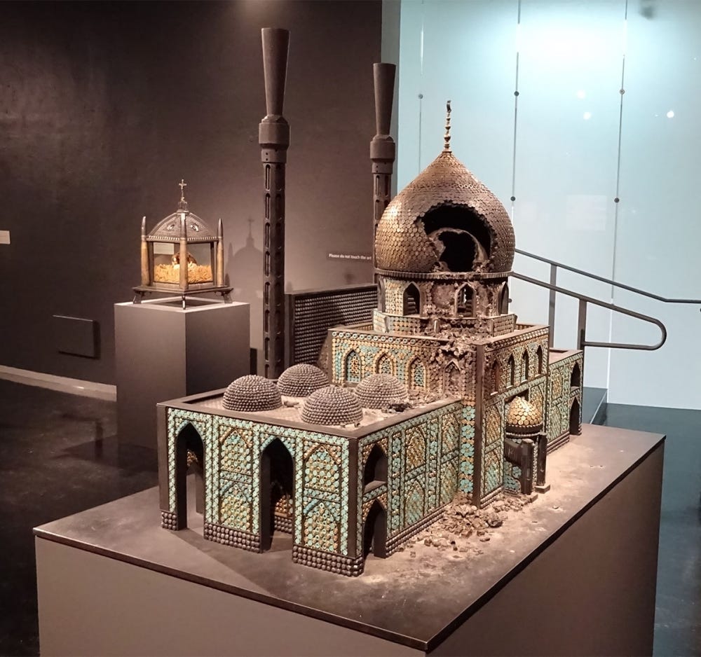 "Bombed Mosque," 2010, guns, gun parts, bullets, steel. Photo by Lisa Edge "Bombed Mosque," 2010, guns, gun parts, bullets, steel. Photo by Lisa Edge