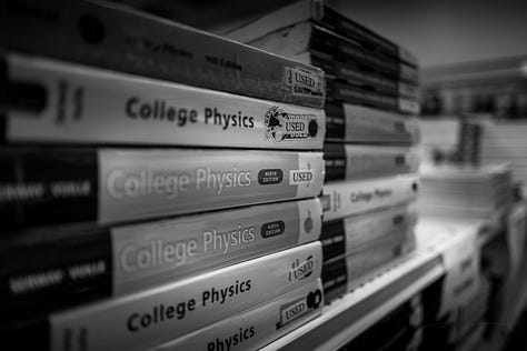 images from inside the bookstore including college physics textbooks and textbooks for sale, branded water bottles and trinkets, and HBCU themed T-shirts
