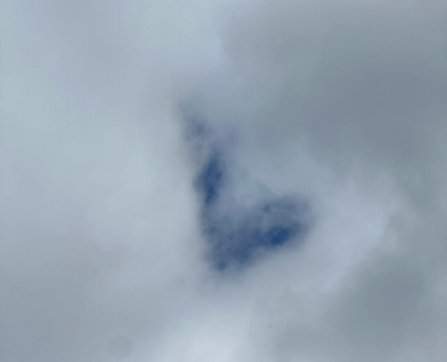 Opening in the clouds - I spy a heart in the sky - ©Amy Boyle Photography 2025