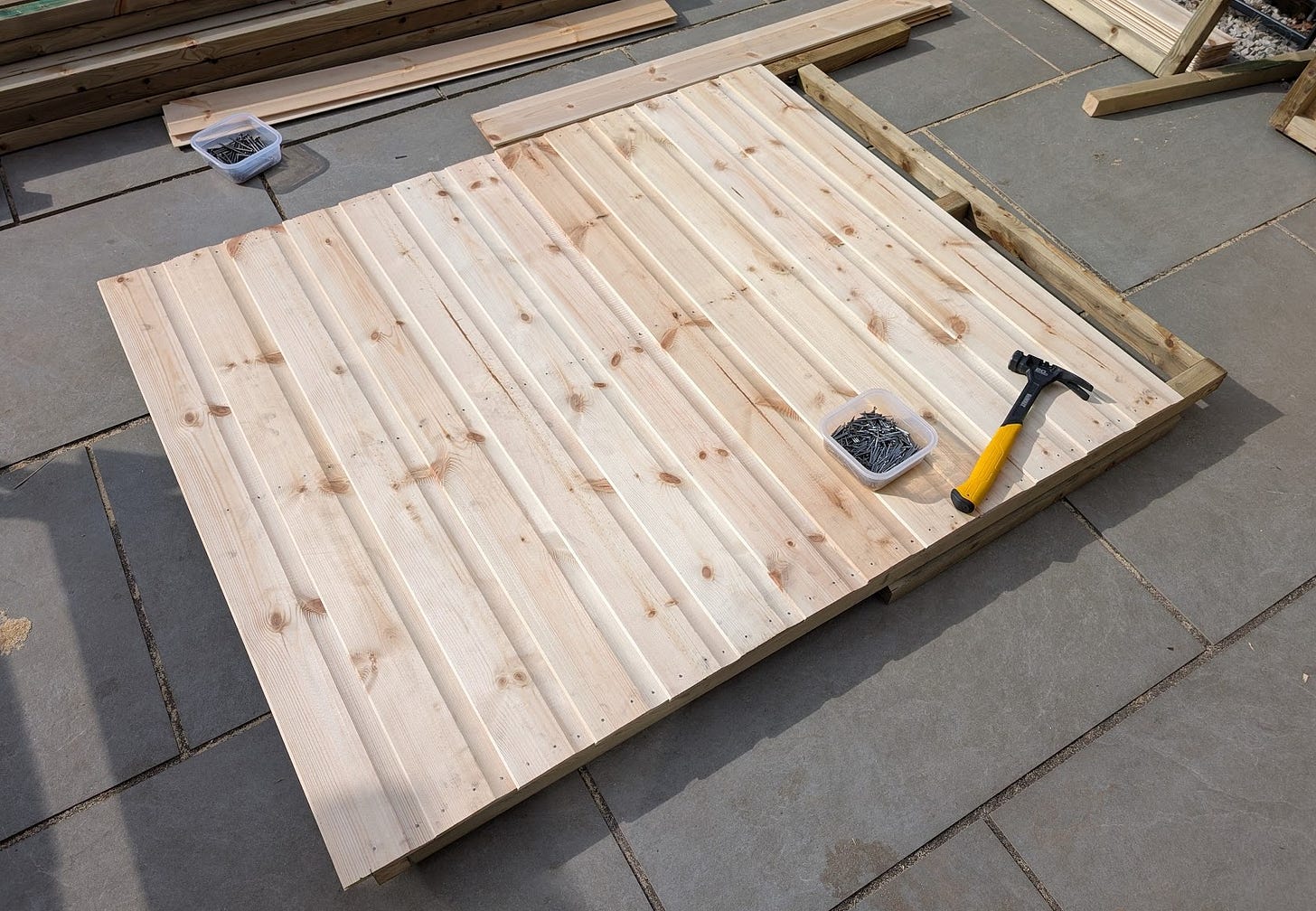 Mostly clad side wall of the shed. The top has been left while the birdsmouth joints are cut. 