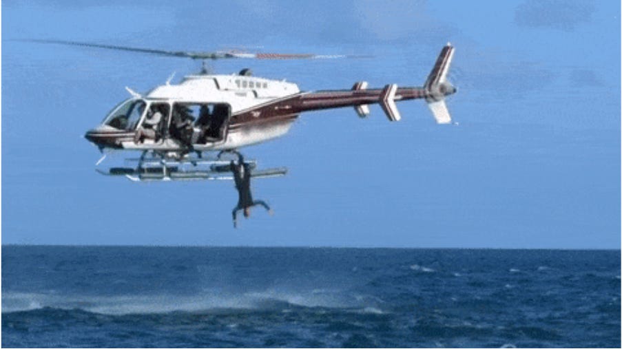 Diver jumping from a helicopter