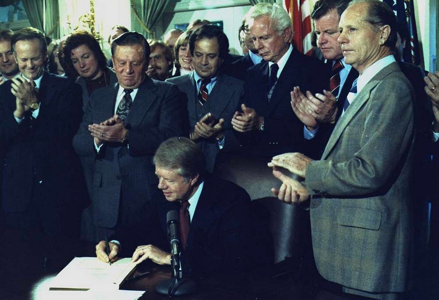 President Carter signing the Airline Deregulation Act in 1978. President Carter signing the Airline Deregulation Act in 1978.