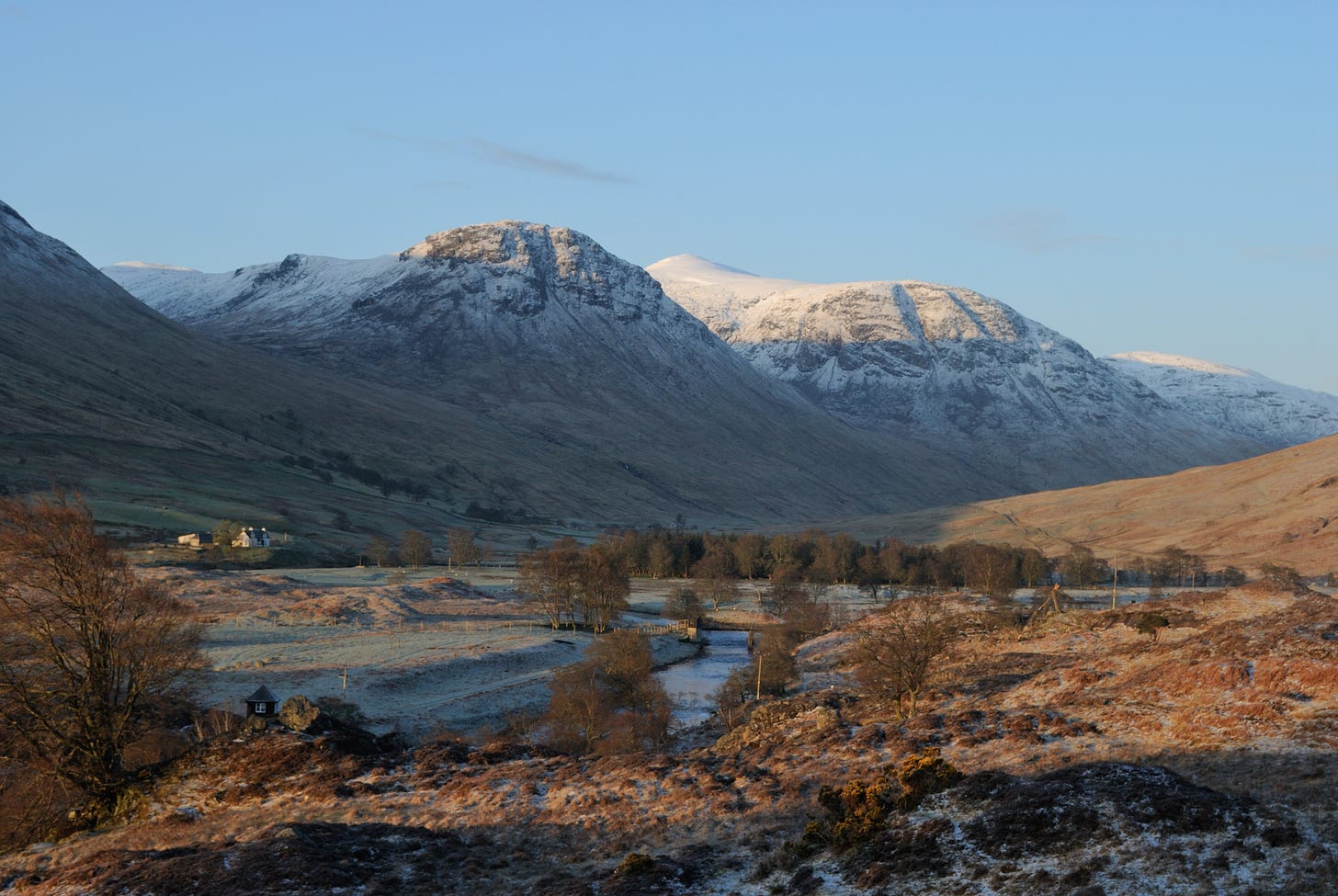 Snowy craggy mountain, frosty valley, river