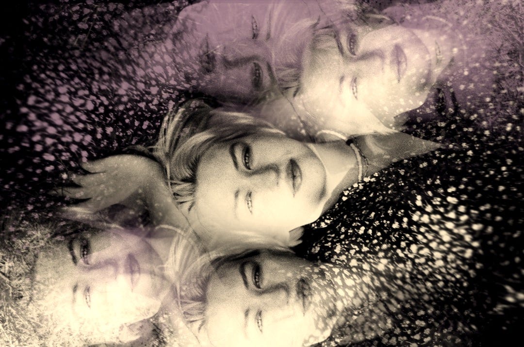 a group of women laying down next to each other a group of women laying down next to each other